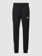 ADIDAS SPORTSWEAR Sweatpants mit Label-Stitching in Black, Größe S