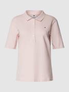 Tommy Hilfiger Poloshirt mit kurzer Knopfleiste in Hellrosa, Größe S