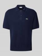Lacoste Relaxed Fit Poloshirt mit Logo-Badge in Dunkelblau, Größe S