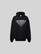 VETEMENTS Oversized Hoodie mit Label-Print in Black, Größe S