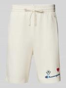 CHAMPION Regular Fit Sweatshorts mit Motiv-Print in Beige, Größe L