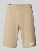 PUMA PERFORMANCE Sweatshorts mit elastischem Bund in Beige, Größe M