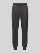 PUMA PERFORMANCE Tapered Fit Sweatpants mit Label-Print in Black, Größ...