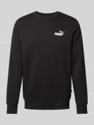 PUMA PERFORMANCE Sweatshirt mit Label-Print in Black, Größe L