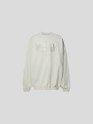 VETEMENTS Oversized Sweatshirt mit Label-Detail in Offwhite, Größe L