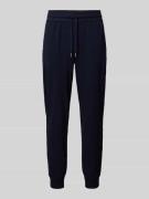 Tommy Hilfiger Tapered Fit Trackpants mit Tunnelzug in Marine, Größe L