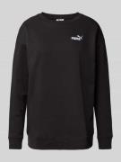 PUMA PERFORMANCE Sweatshirt mit Label-Stitching in Black, Größe L