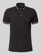 Tommy Hilfiger Slim Fit Poloshirt mit Logo-Stitching in Black, Größe M