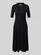 Christian Berg Woman Polokleid mit Druckknopfleiste in Black, Größe S