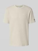 CHAMPION T-Shirt mit Logo-Stitchings und Rundhalsausschnitt in Beige, ...