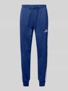 adidas Sportswear Sweatpants mit elastischem Bund in Marine, Größe L