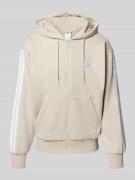 adidas Sportswear Sweatjacke mit Kapuze und Känguru-Tasche in Sand, Gr...
