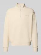 Tommy Jeans Regular Fit Troyer aus Baumwoll-Mix in Sand, Größe L