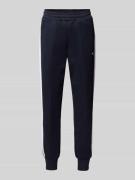 PUMA PERFORMANCE Sweatpants mit Reißverschlusstaschen in Marine, Größe...