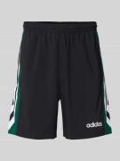 adidas Originals Shorts mit Label-Stitching Modell '90s FTBL' in Black...