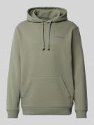 Tommy Jeans Relaxed Fit Hoodie aus reiner Baumwolle in Oliv, Größe L