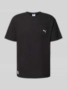 PUMA PERFORMANCE Relaxed Fit T-Shirt mit Brusttasche in Black, Größe L