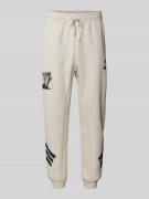 adidas Sportswear Sweatpants mit elastischem Bund in Beige, Größe M