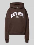 Review Oversized Hoodie mit Label-Print in Dunkelbraun, Größe L