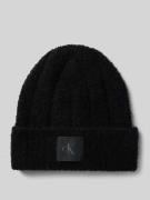 CK Calvin Klein Beanie in Bouclé-Optik mit Woll-Anteil in Black, Größe...