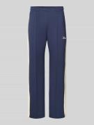 KARL KANI Sweatpants mit Längsnähten und Label-Print in Dunkelblau, Gr...