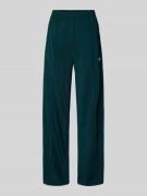 adidas Originals Sweatpants mit elastischem Bund in Dunkelgruen, Größe...
