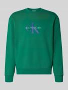 Calvin Klein Jeans Sweatshirt mit Rundhalsausschnitt und Logo in Dunke...
