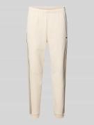 Lacoste Regular Fit Sweatpants aus reiner Baumwolle in Offwhite, Größe...