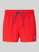 PUMA Badehose mit Seitentaschen und Klettverschlusstasche hinten in Ro...