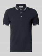 Lindbergh Relaxed Fit Poloshirt mit Kontraststreifen in Black, Größe L