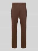 KARL KANI Straight Fit Sweatpants mit Logo-Stitching in Dunkelbraun, G...