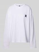 Karo Kauer Oversized Longsleeve mit rückseitigem Statement-Print in We...