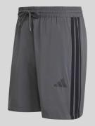 adidas Sportswear Regular Fit Trainingsshorts mit Tunnelzug in Anthraz...