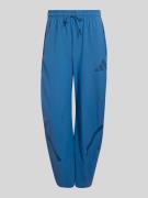 adidas Sportswear Trainingshose Modell 'Z.N.E. WOVEN' in Blau, Größe L