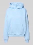 REVIEW Hoodie mit Logo-Print und Känguru-Tasche in Hellblau, Größe L