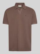 Calvin Klein Jeans Regular Fit Poloshirt aus reiner Baumwolle in Schok...