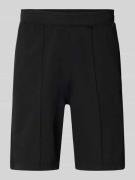 CHAMPION Bermudas mit elastischem Bund und Label-Stitching in Black, G...