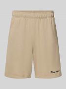 CHAMPION Shorts mit elastischem Bund und Label-Stitching in Beige, Grö...