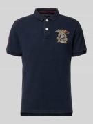Superdry Regular Fit Poloshirt mit Label-Patches in Marine, Größe L