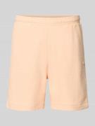 Lacoste Regular Fit Sweatshorts aus reiner Baumwolle in Lachs, Größe L