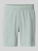 CHAMPION Shorts mit Strukturmuster und elastischem Bund in Lind, Größe...