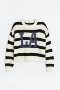 H&M+ Pullover mit Frontmotiv Cremefarben/LA in Größe XXL. Farbe: Cream...