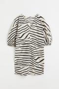 H&M Kleid mit V-Ausschnitt Cremefarben/Zebramuster, Alltagskleider in ...