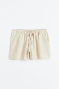 H&M Pull-on-Shorts aus Leinenmix Hellbeige in Größe L. Farbe: Light be...
