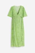 H&M MAMA Kleid mit V-Ausschnitt Grün/Geblümt, Kleider in Größe XS. Far...