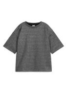 Arket Glitzer-T-Shirt hellgrau/Metallic, T-Shirts & Tops in Größe 86/9...