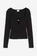 H&M Shirt mit Perle Schwarz, Tops in Größe L. Farbe: Black