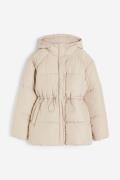 H&M Puffer-Jacke mit Tunnelzug Hellbeige, Jacken in Größe XL. Farbe: L...