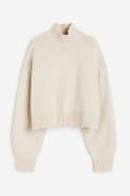 H&M Oversized Pullover mit Turtleneck Hellbeige in Größe XL. Farbe: Li...