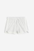 H&M Sweatshorts Hellgraumeliert in Größe 104. Farbe: Light grey marl